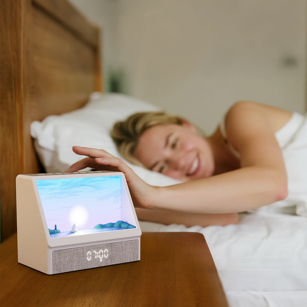 LumiRise smart sunrise wake-up light glowing warm on a minimalist nightstand